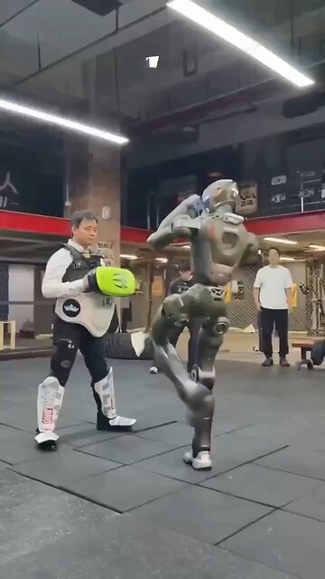 A Chinese company has taught a robot to kick down doors and fight people