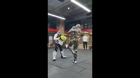 A Chinese company has taught a robot to kick down doors and fight people