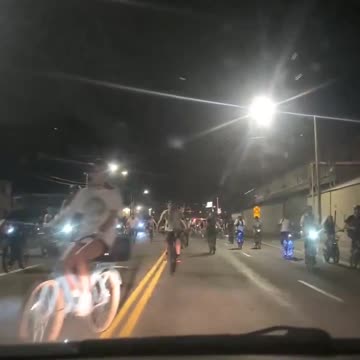 Driver gets impatient after waiting for hundreds of bikes