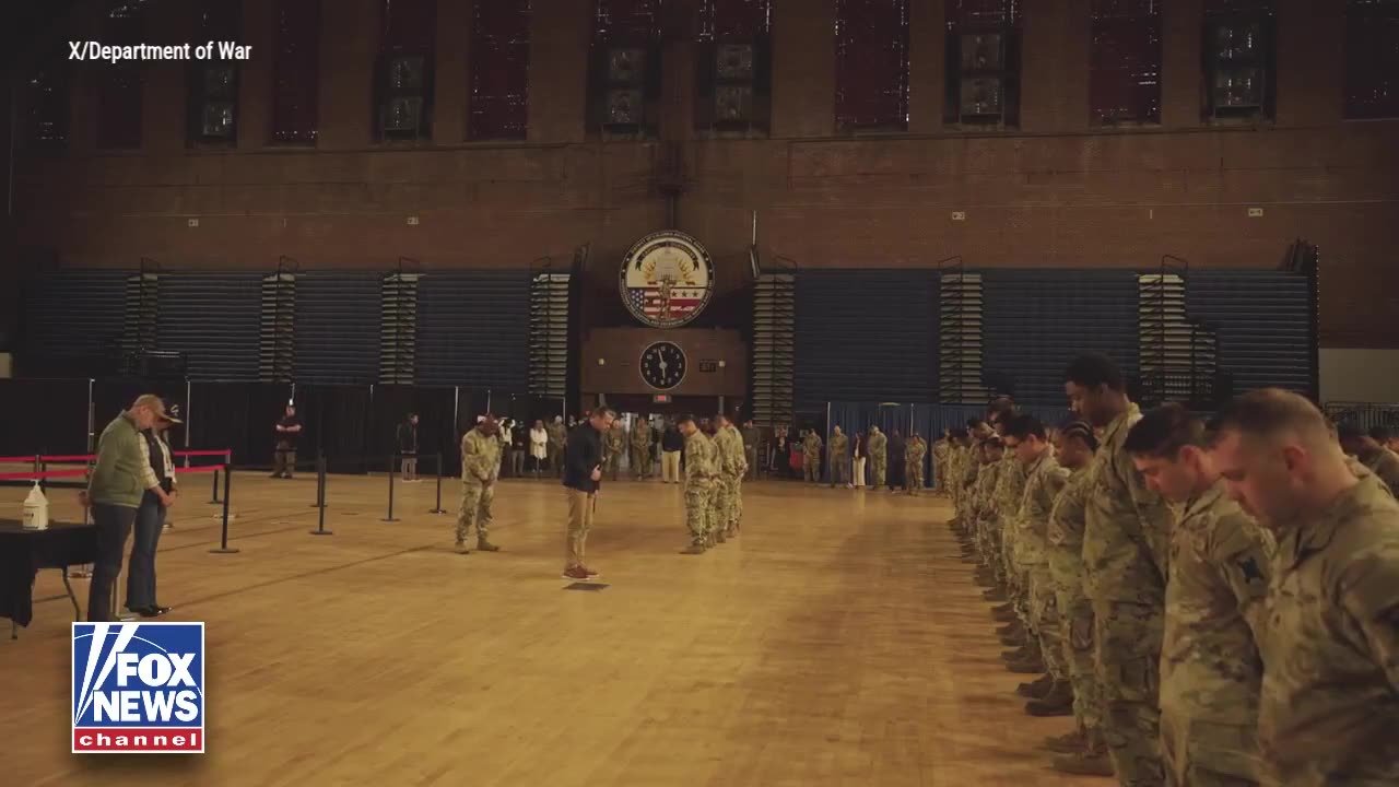 The U.S. Secretary of war praying for the late Guardsman who was gunned down by an Afghan