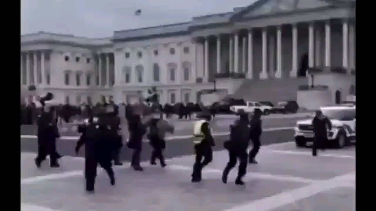 Here's a Capitol Police Officer waving the protesters in!