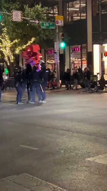 Police take down scumbags blocking the street in Austin, Texas.