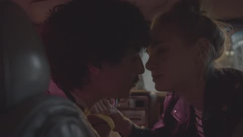 Romantic Couple Kissing Inside the Car