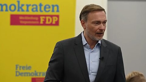 Protester throws cake at ex-German Finance Minister Christian Lindner