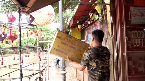 Hoi An lantern shop owner rebuilds after floods in Vietnam