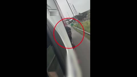 British lorry driver realises stowaway migrant has hitched a ride