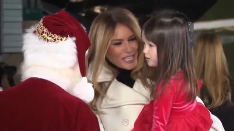Amazing Moment First Lady Melania Picks Up Child at Toys For Tots Drive