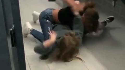 Girl fight in school toilets