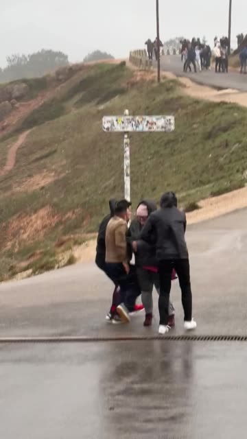 Sudden Windstorm Knocks People Off Their Feet