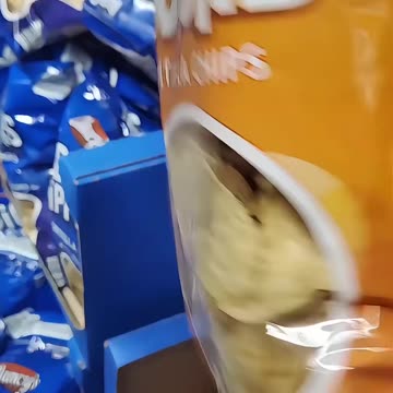 American at the grocery store shows that every single thing she picks up now says