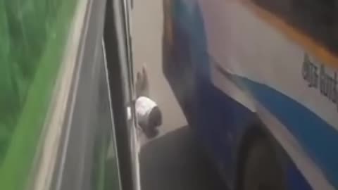 A boy got stuck between two buses