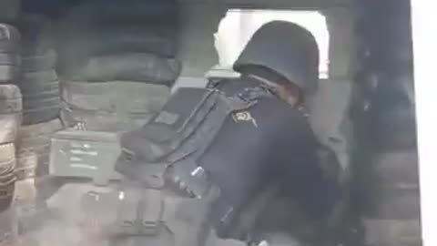 Entrenched Cambodian Soldiers Look Strait from WW2