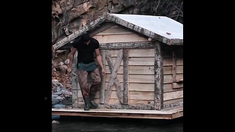 He built a cozy shelter above water so he could fish from it. Impressive -)