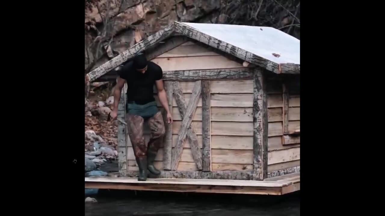 He built a cozy shelter above water so he could fish from it. Impressive -)
