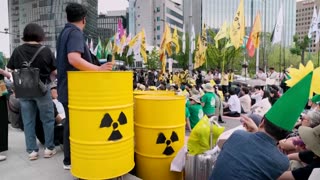 Climate activists rally in Seoul as Trump brands crisis ‘con job’