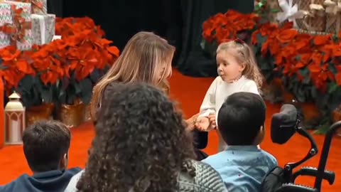 Little Girl Runs Into First Ladys Arms at National Childrens Hospital