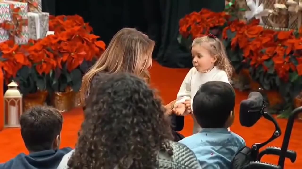 Little Girl Runs Into First Ladys Arms at National Childrens Hospital