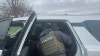 Four agents vs. one guy who really didn’t want to leave. Two-minute wrestling match on the grass.