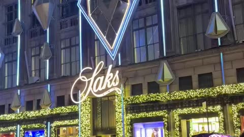 America's New Religion: Consumerism Exposed in Saks' Dazzling Holiday Lights!