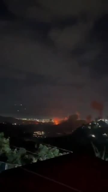 Suspected U.S. Apache and CH-47 aircraft fly over Caracas, Venezuela.