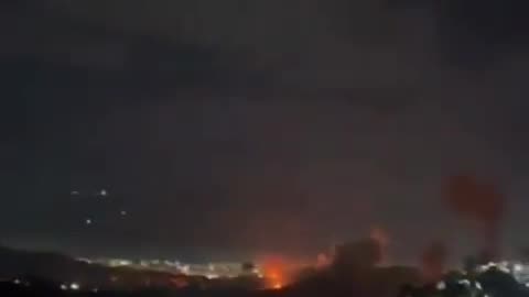 Suspected U.S. Apache and CH-47 aircraft fly over Caracas, Venezuela.