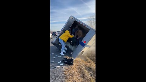 Armored car crashes and gets looted