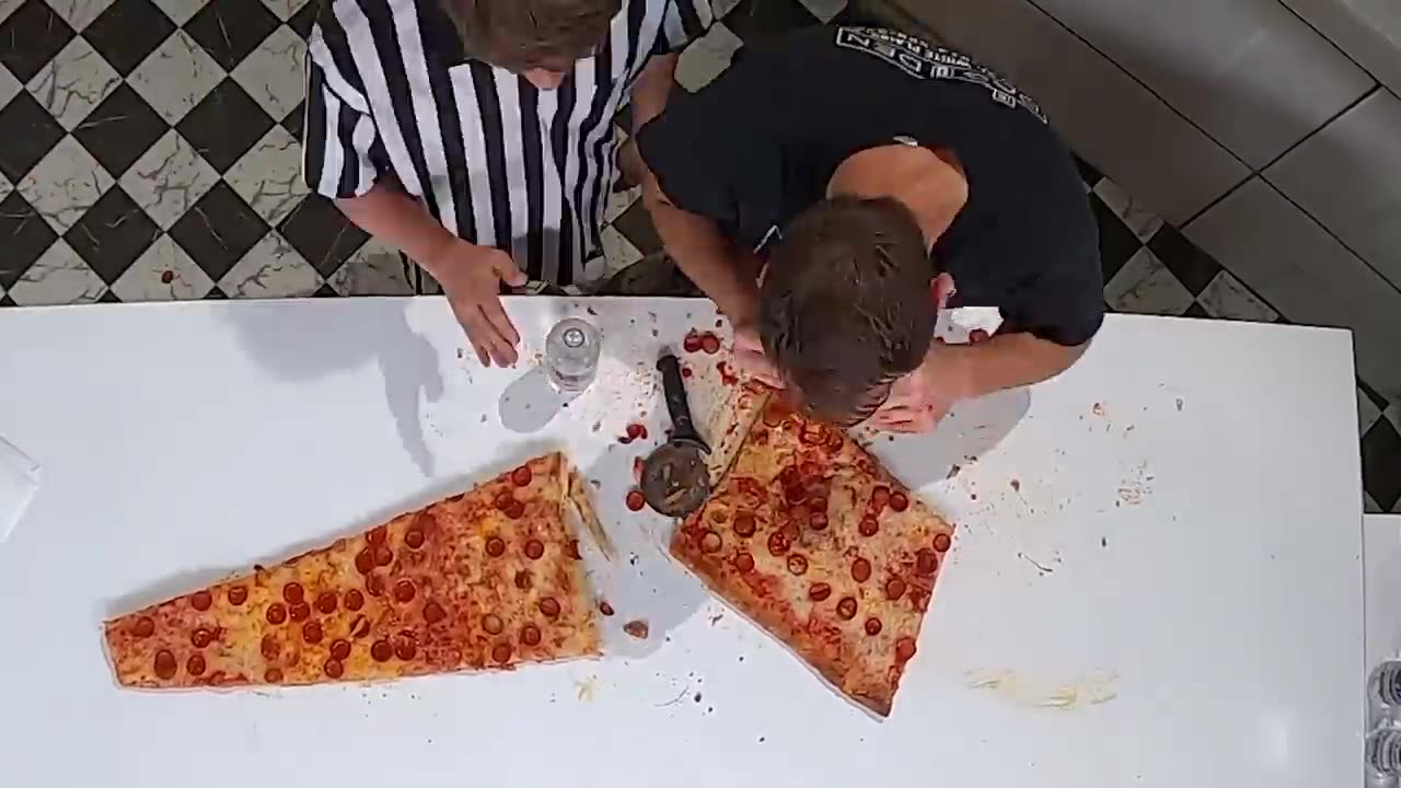 I Ate The World’s Largest Slice Of Pizza - MrBeast