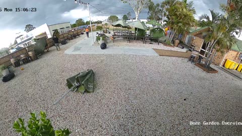 Man Knocked Off His Feet By Flying Umbrellas