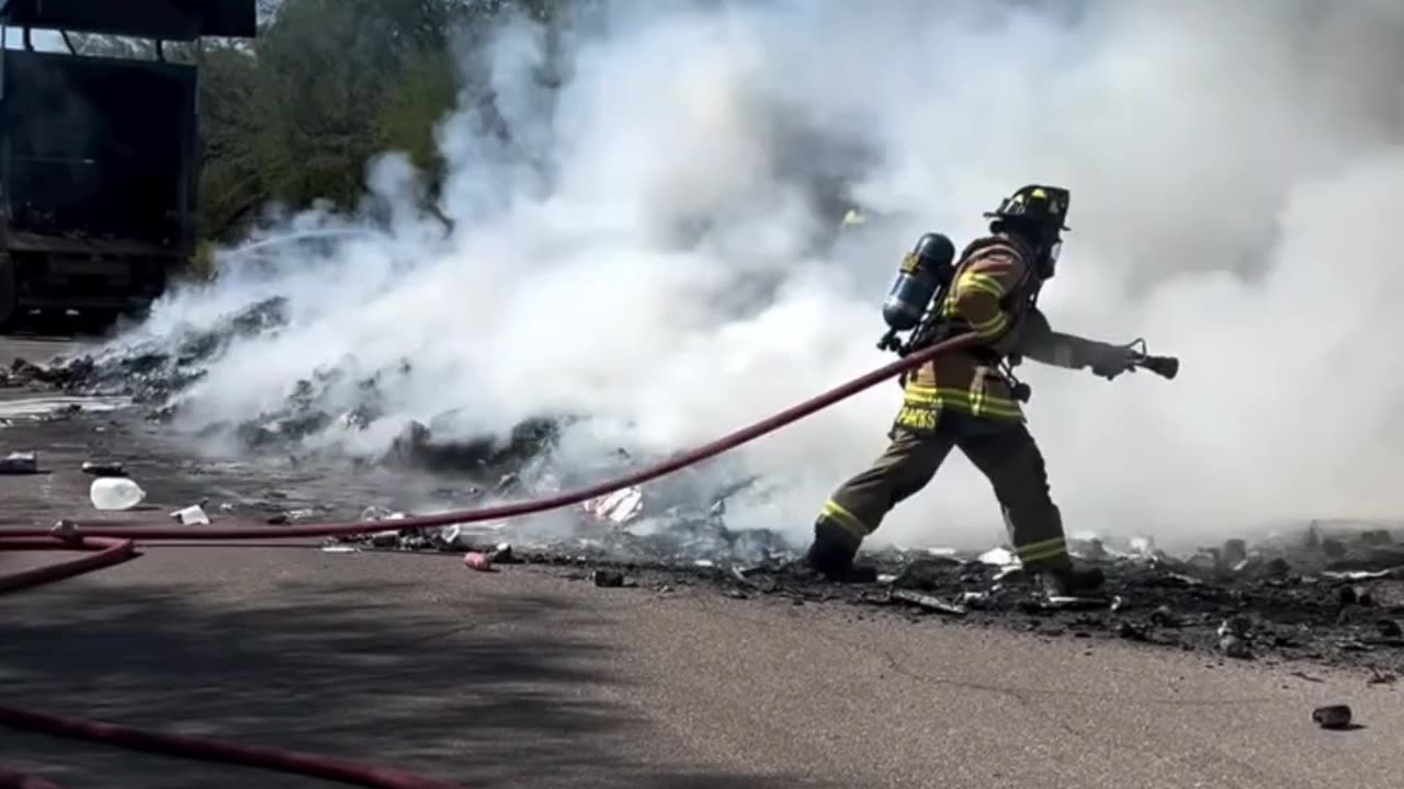 FIREFIGHTERS WORKED TO QUICKLY EXTINGUISH THE CONTENTS OF THE TRUCK