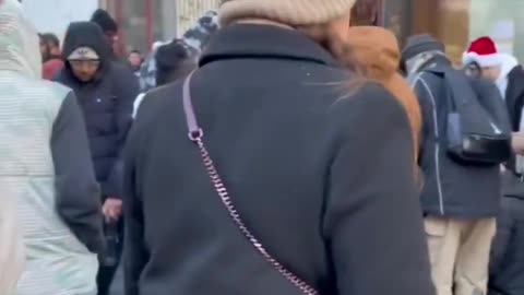 A New York City yellow taxi struck pedestrians in Herald Square on Christmas Day