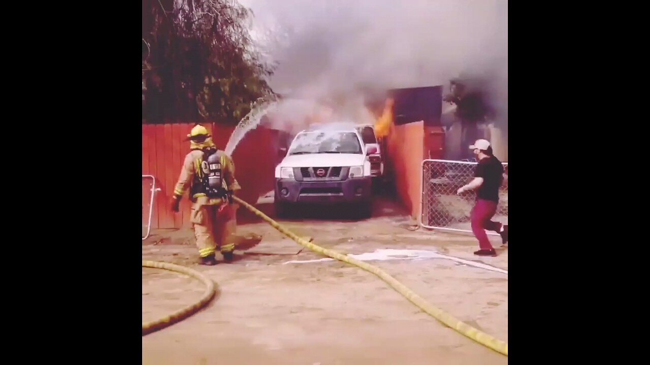 Man runs into burning fire to save his dog.
