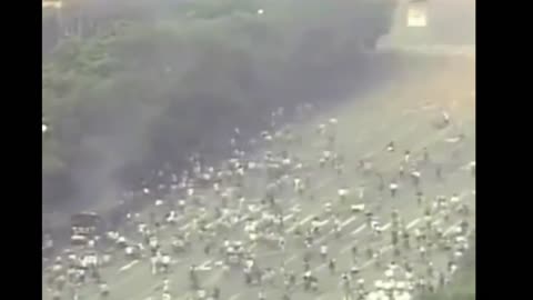 Chinese communist forces killing hundreds of students Tiananmen Square in Beijing on June 4th, 1989