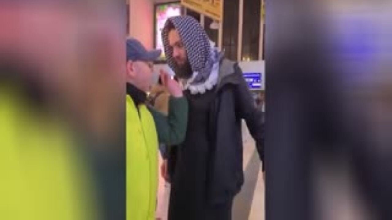 Muslim Woman Spits On German Man After Her Rabid Husband Threatens To Assault The Man Filming Him