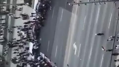 Just some Canadians praying on the street........ blocking traffic