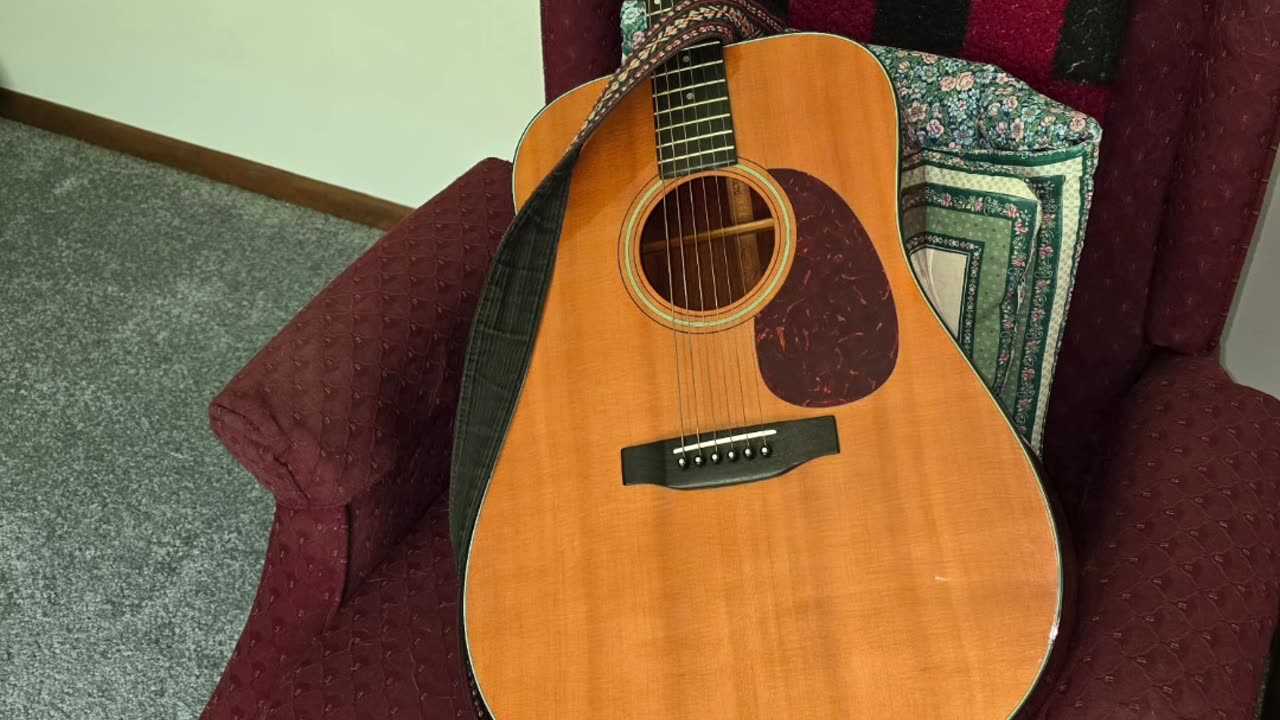 Sigma acoustic guitar.