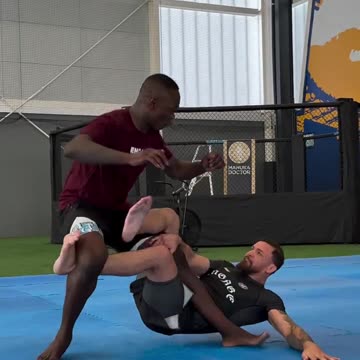 Mauricio Ruffy Shows Israel Adesanya His Leg Scissors Takedown