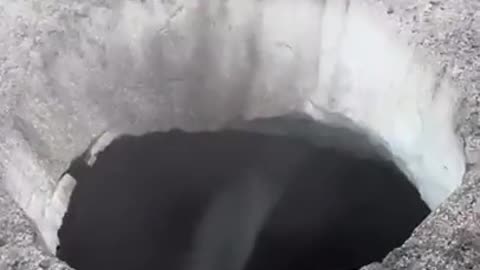 Alaskan helicopter pilot shows holes In melting glaciers..