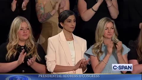 Rep. Gooden ripped a sign saying "this is not normal" out of a Dem's hand as Trump walked by