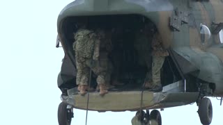 Japanese, US paratroopers leap from aircraft in annual drills