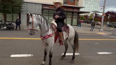 Man on horse pushes up on @Tommy4Trump420 threatens to shoot him