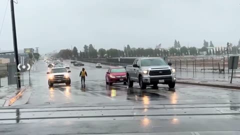 Heavy rain filled a North Hollywood street Tuesday morning