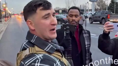 Jake Lang Takes Cheap Shot to the Face at Anti-Islamification Rally, Then Slaps Koran With Bacon