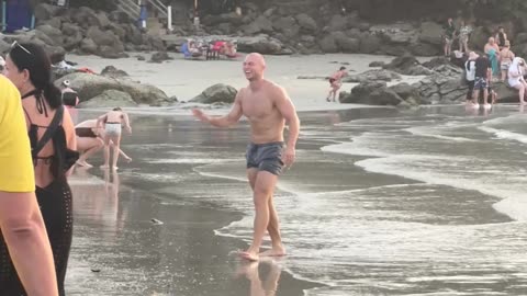 Beach Acrobatics Versus Bottle Balance