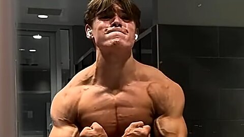 17 years old teen boy flexing muscles
