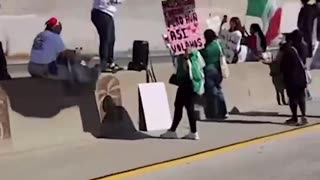 Street level view of the 101 Freeway takeover by anti-ICE protestors in Los Angeles