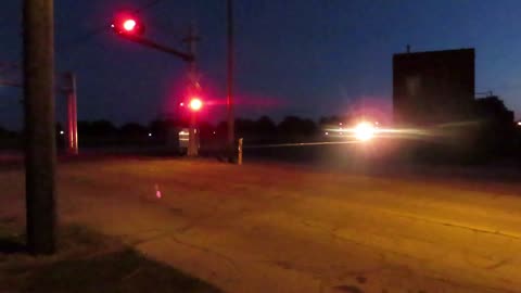 Norfolk Southern train going through Bellevue, Ohio at night