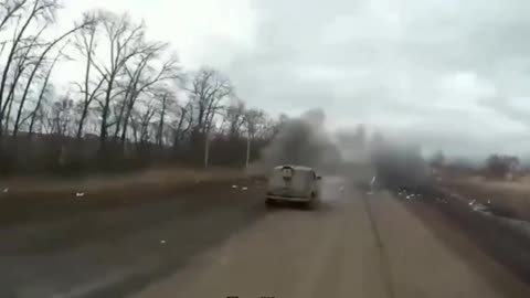 Ukrainian Soldier Jumps Out of Vehicle to Shoot Down Incoming Drone