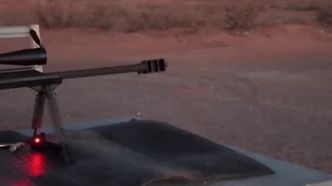50 BMG at dawn, big muzzle flash