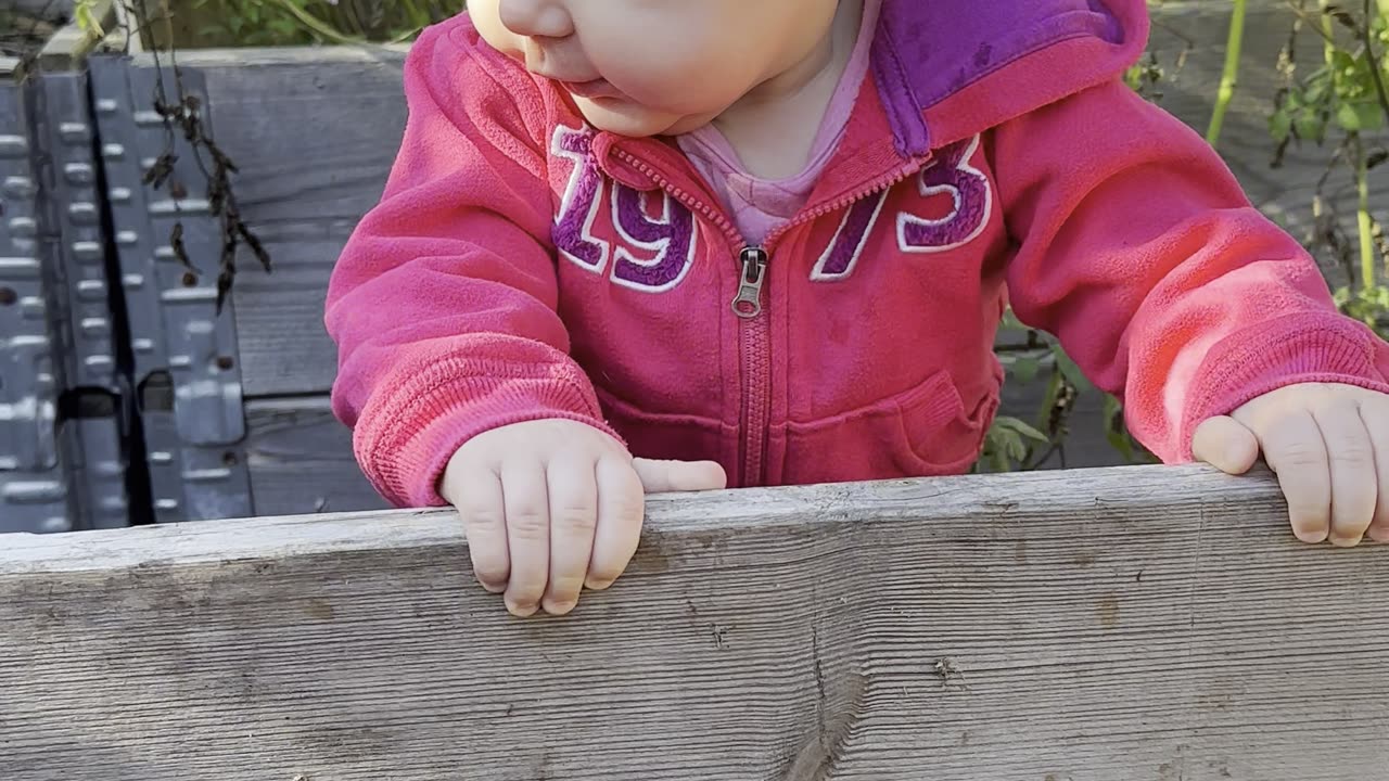 Tiny hands, big curiosity 🌱 Baby Kayla is gardening and loving it!