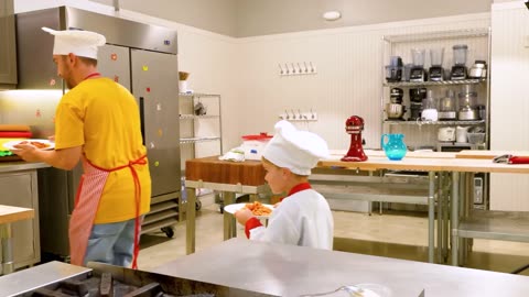 Children learn to cook pasta